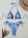 Women's denim blue printed bikini with strap design showing front and back views