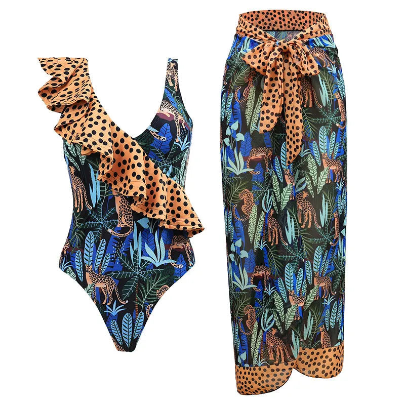 Women's solid colour one-piece swimsuit with spaghetti straps and a matching skirt laid flat.