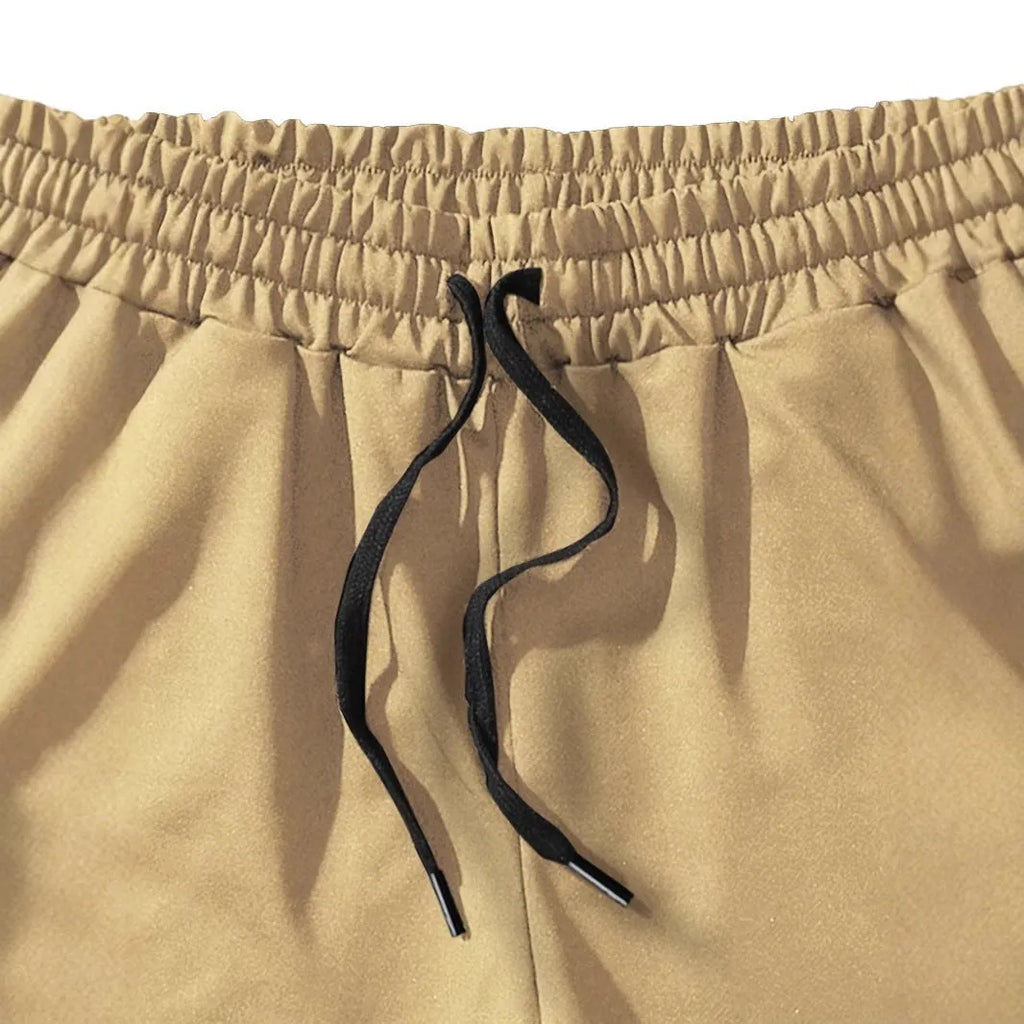 Men's khaki coconut print polyester sports shorts with straight cut design
