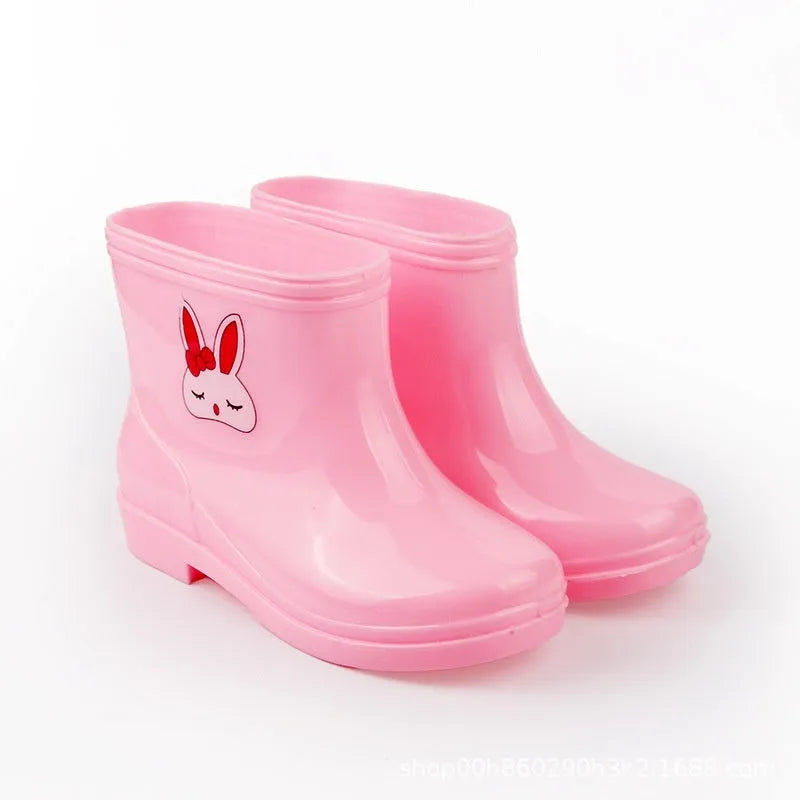 Children's non-slip plastic rain boots in solid colour with mid-calf height, available in multiple sizes