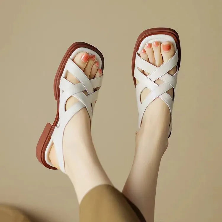 Women's patent leather square toe beach sandals with cross straps in black, brown, and off-white colours.
