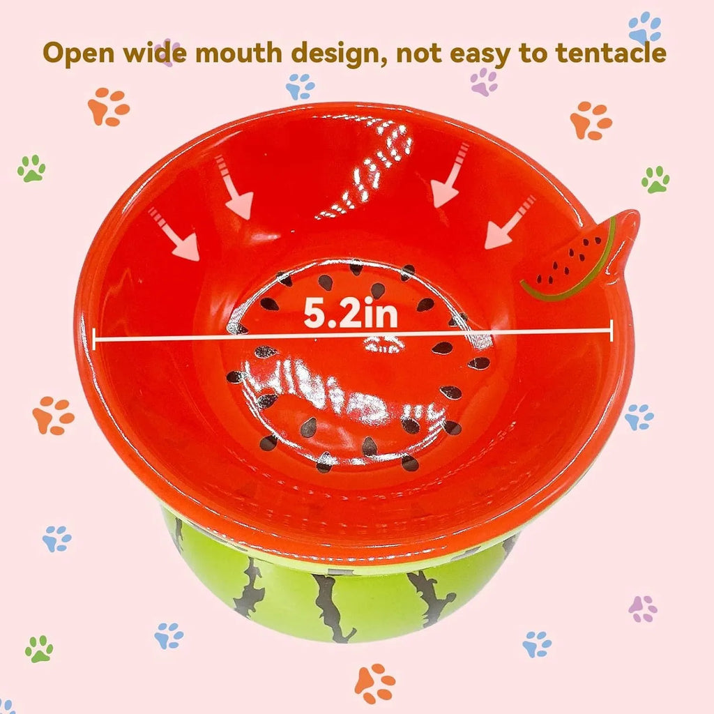 Orange patterned ceramic elevated cat bowl on a white surface