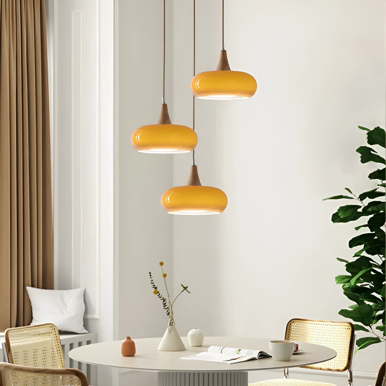 Cream style dining room chandelier with glass shade and wood art frame
