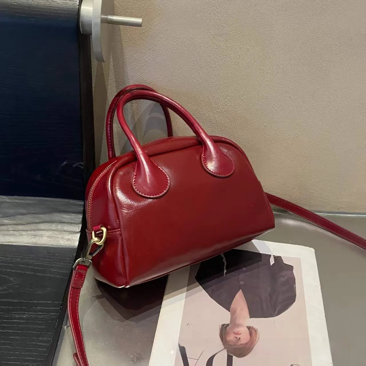Genuine leather mini bowling bag in pillow shape, top grain leather, 24cm, with single strap, five colour options