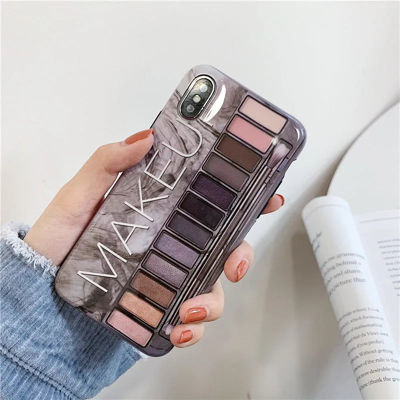 Silicone phone case with eye shadow pattern for iPhone, shown in Flesh and Grey colours