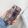 Silicone phone case with eye shadow pattern for iPhone, shown in Flesh and Grey colours