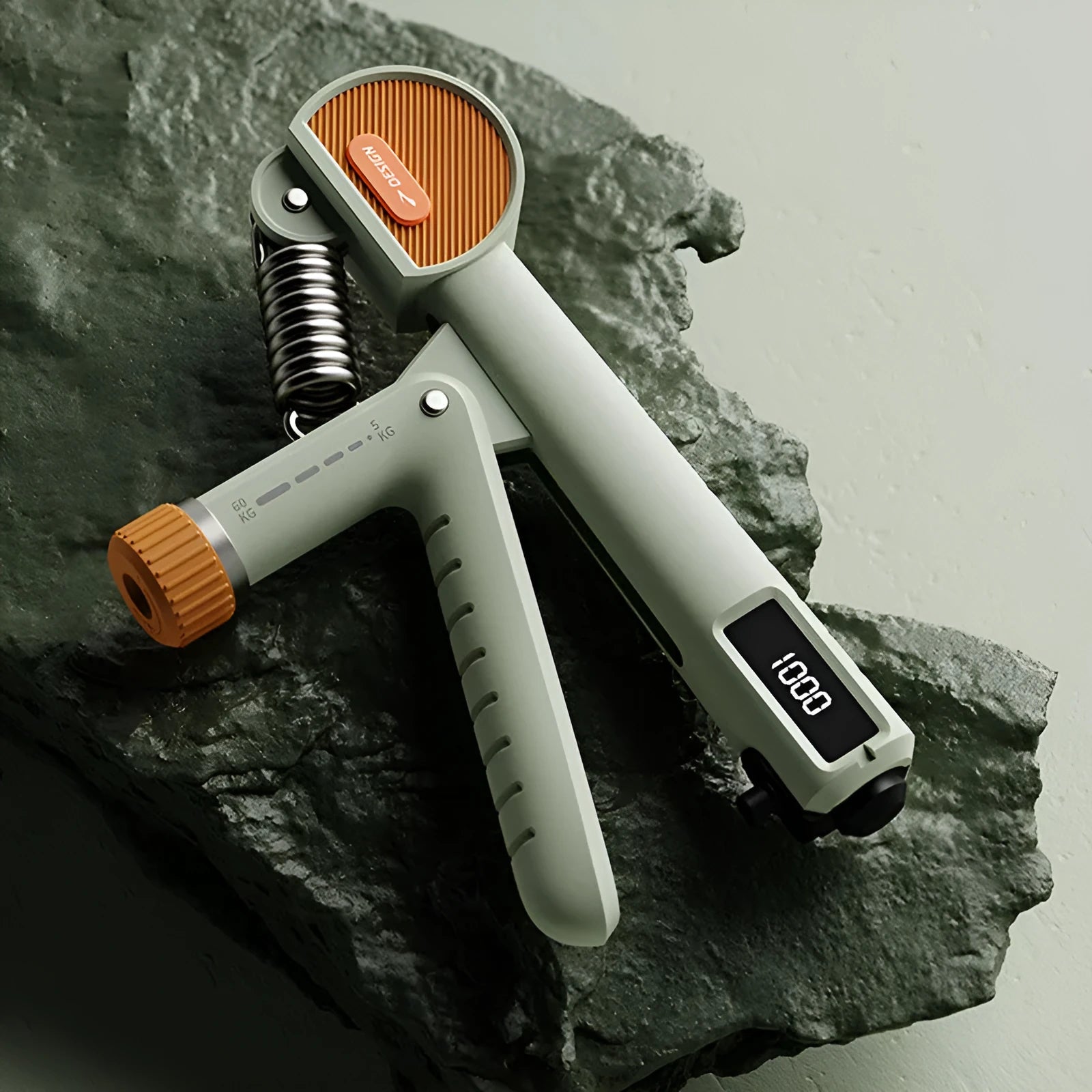 Adjustable count spring grip trainer in ivory white, dark black, or army green