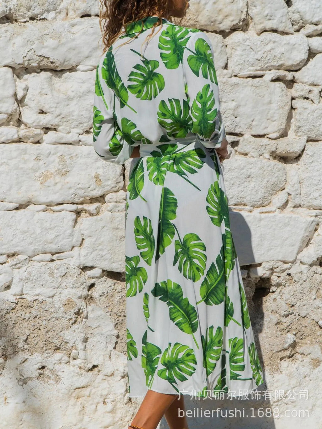 Women's vintage-style chiffon A-line dress with V-neck, high waist, and printed pattern.