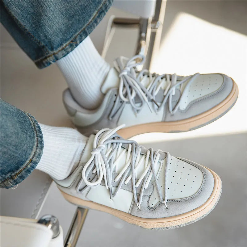 Men's low-top lace-up sneaker in beige with microfiber upper, rubber sole, and round toe design