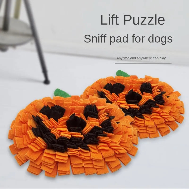 Orange pumpkin-shaped dog sniffing mat with furry fabric texture for slow feeding
