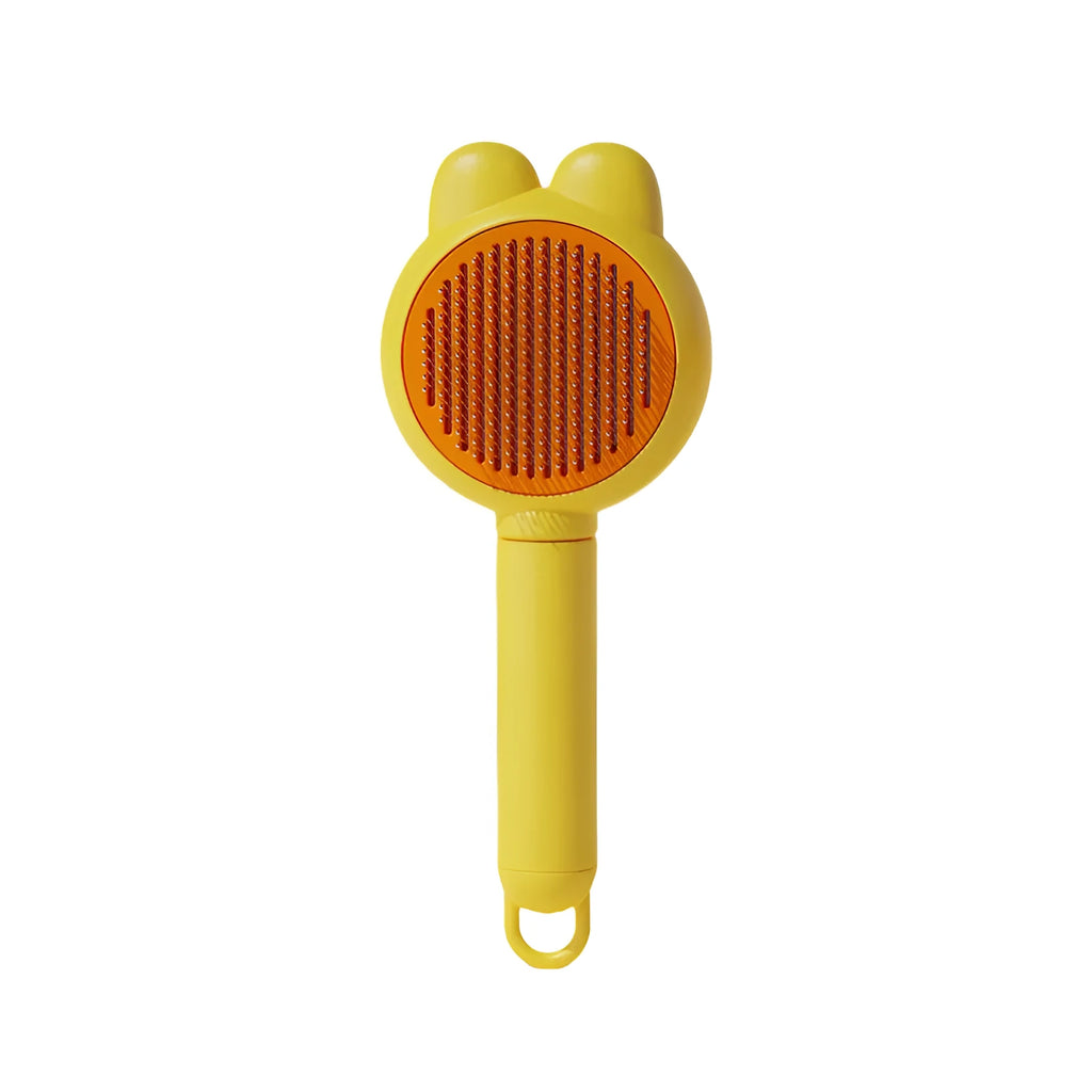 Green self-cleaning pet grooming brush with stainless steel teeth and rubber tips