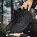 Waterproof fleece-lined unisex snow boots with rubber sole and lace-up front.