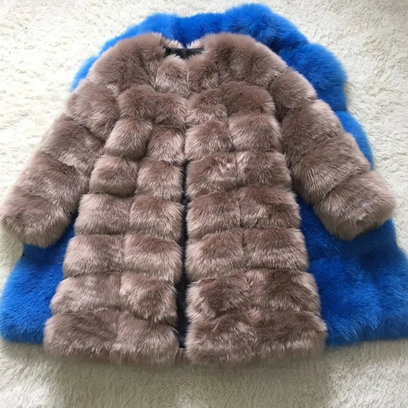 Women's long artificial fur coat in a wine red colour, showing regular sleeves and a mid-length fit.
