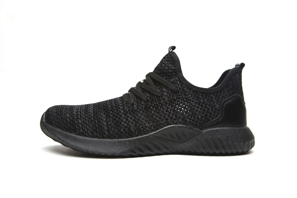 Black low-cut work safety shoes with a visible steel toe cap and textured EVA sole.