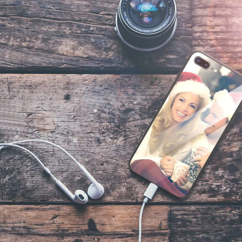 Ultra-thin iPhone case with raised bumper edge shown on an iPhone, highlighting camera and screen protection.