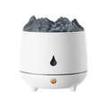White or black volcano-shaped ultrasonic humidifier with USB cable for rooms up to 20 square metres.