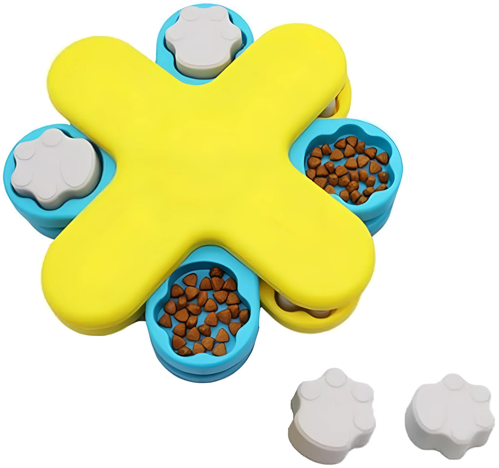Yellow interactive dog puzzle feeder toy with rotating lids on a non-slip base
