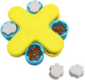 Yellow interactive dog puzzle feeder toy with rotating lids on a non-slip base
