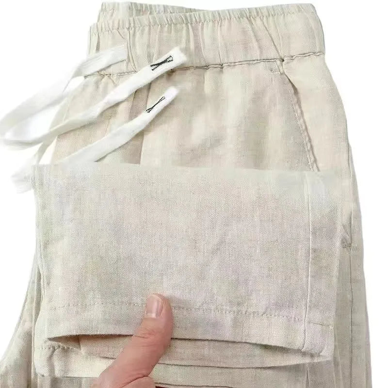 Pure linen-blend straight-leg trousers with a drawstring waist in multiple colours.