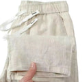 Pure linen-blend straight-leg trousers with a drawstring waist in multiple colours.
