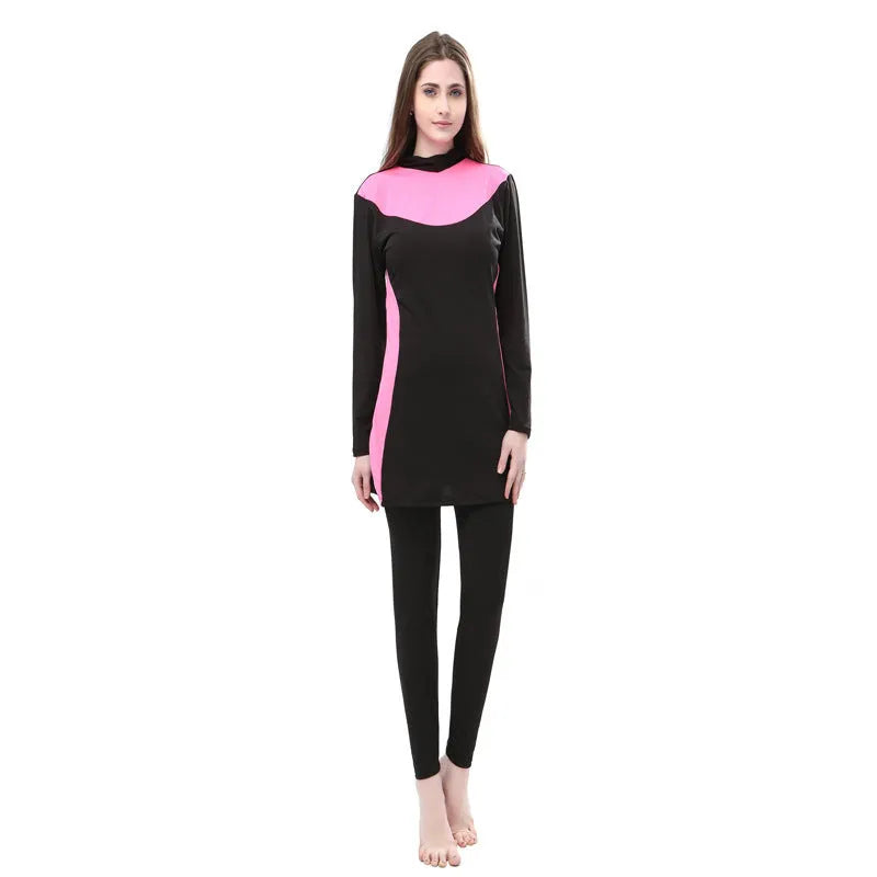 Conservative black women's swimsuit set with long sleeves, a hood, and separate pants.