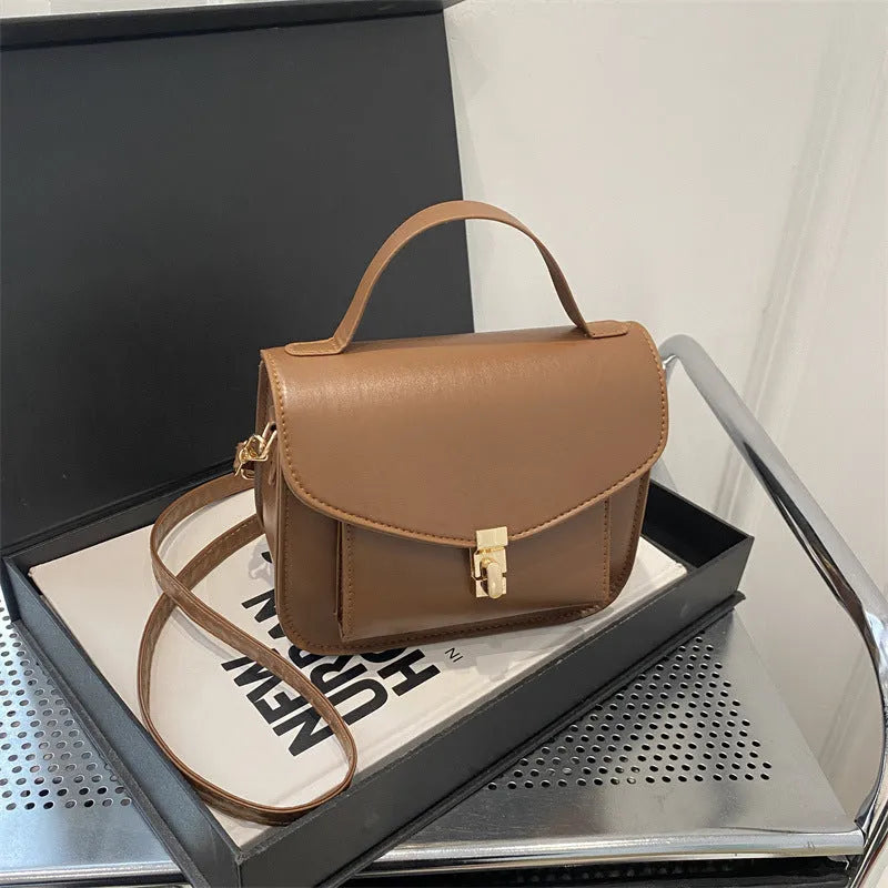 Horizontal square PU leather messenger bag in black colour with document organiser