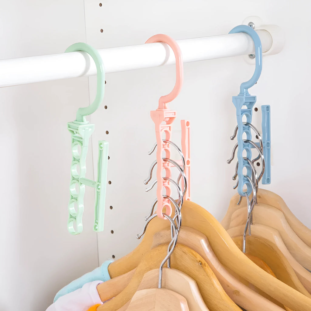 Blue revolving wardrobe hanger with five rotating branches and handle for space saving