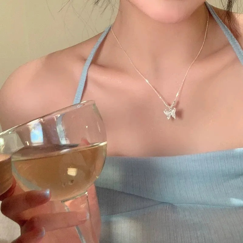 Women's silver butterfly necklace with square opal pendant on cross chain, adjustable length jewellery