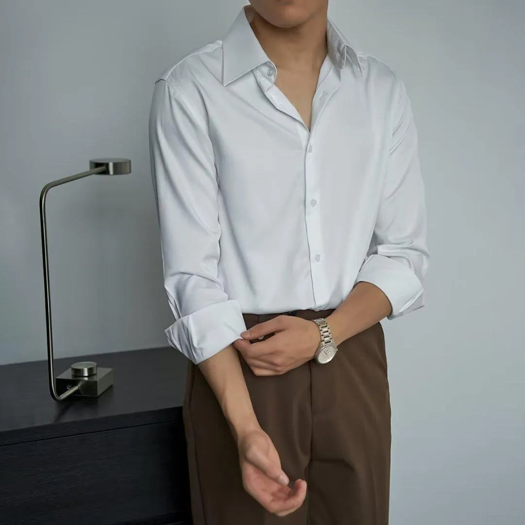 Man wearing a black long sleeve loose fit cardigan in Korean Japanese retro style