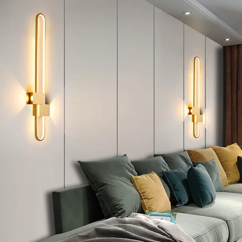 Modern round wall lamp with iron shade in choice of four finishes including black and gold options
