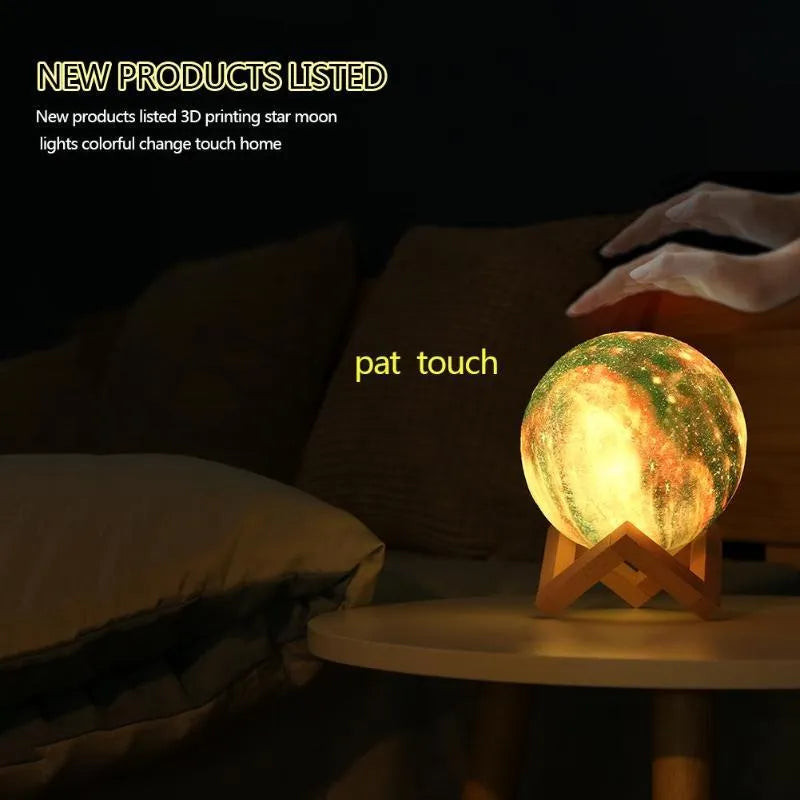 3D printed spherical moon lamp glowing on a surface, showing its textured lunar surface and soft LED light.