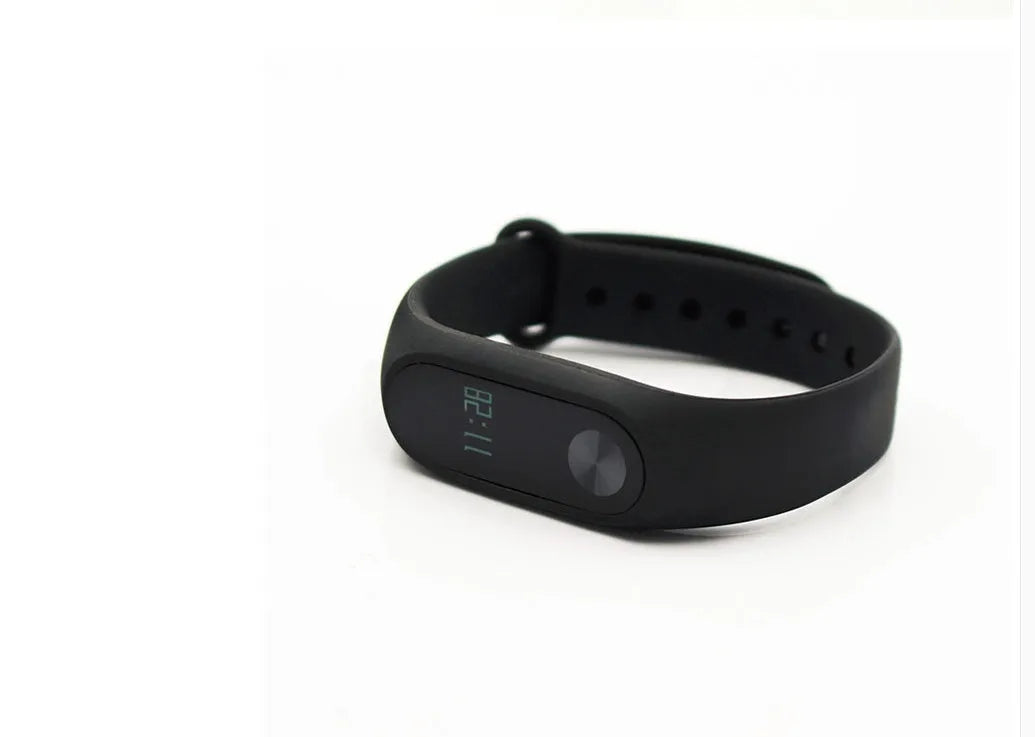 Black Xiaomi Mi Band 2 fitness tracker with OLED screen on adjustable wrist strap