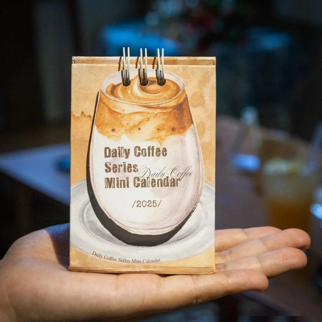 2025 mini desk calendar set showing ten different paper designs including Coffee Time and Life Is Not Easy.