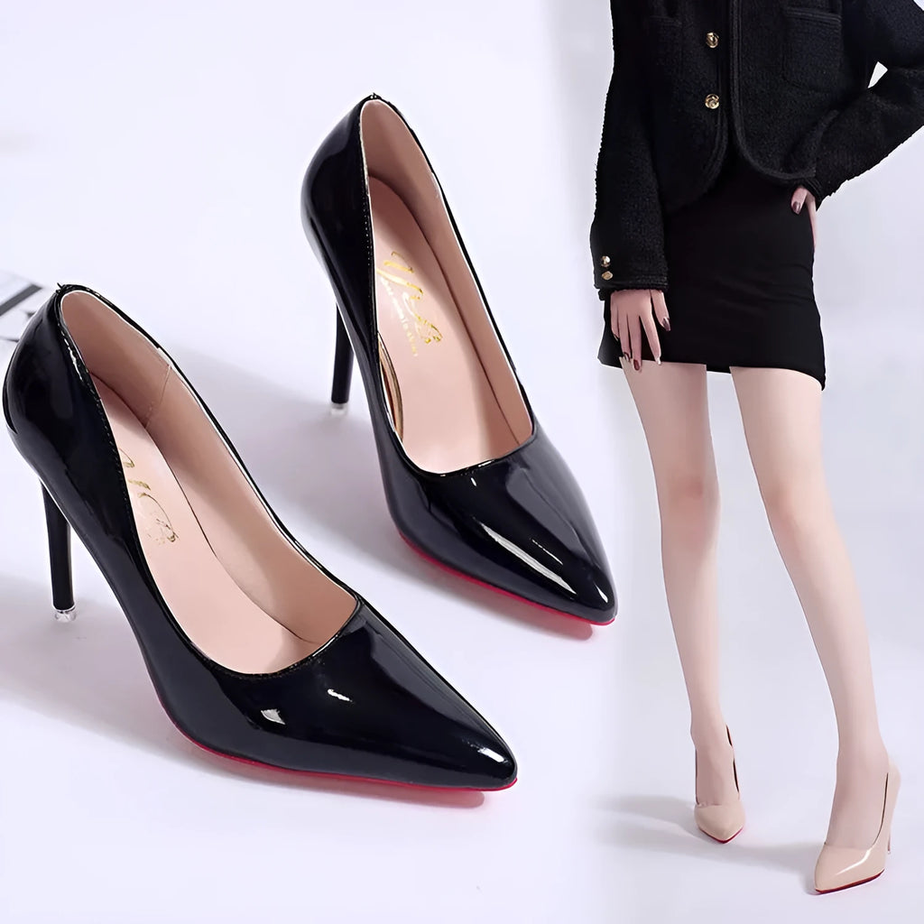 Women's black stiletto heel pumps with pointed toe and shallow mouth design on white background