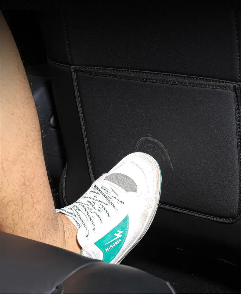 Black leather motorcycle rear seat anti kick pad protector showing full coverage design.