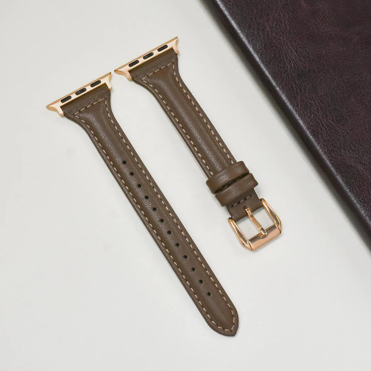 Retro slim leather strap for Apple Watch in caramel colour with rose buckle