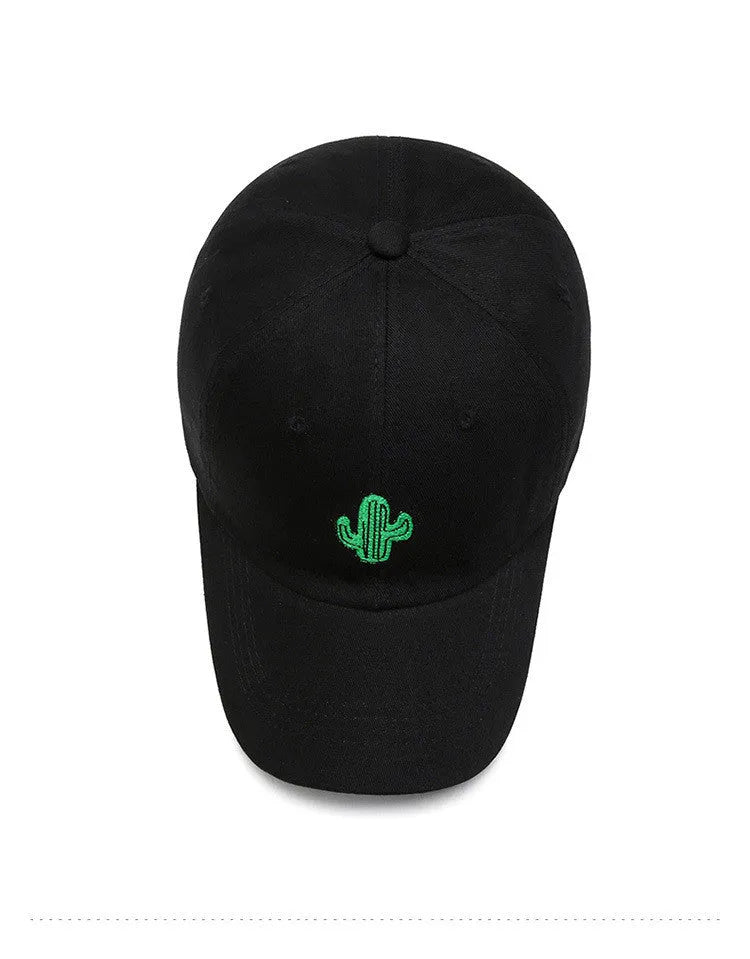 Embroidered cartoon pattern cotton baseball cap in black, white, and pink for men and women
