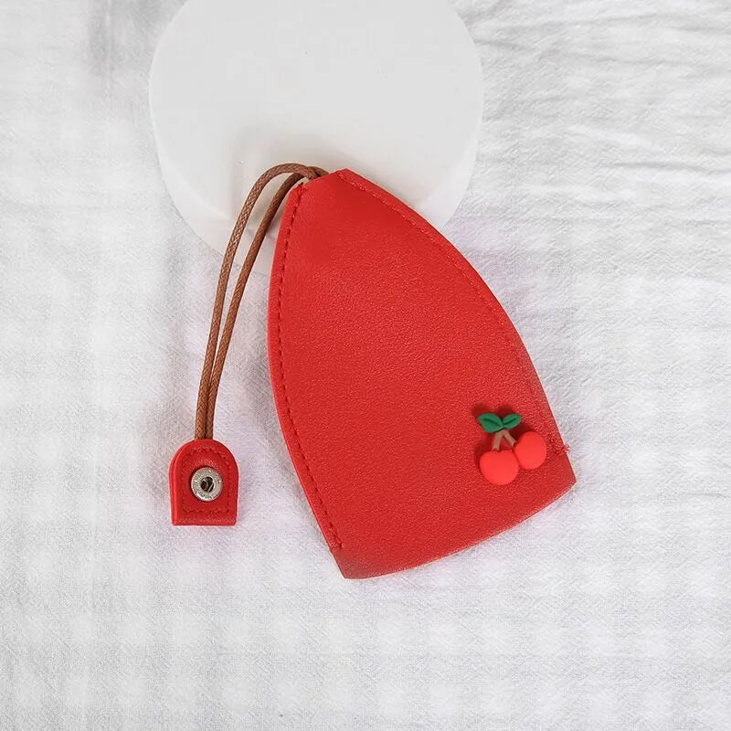 Cartoon design pull-out key case for car keys in PU leather.