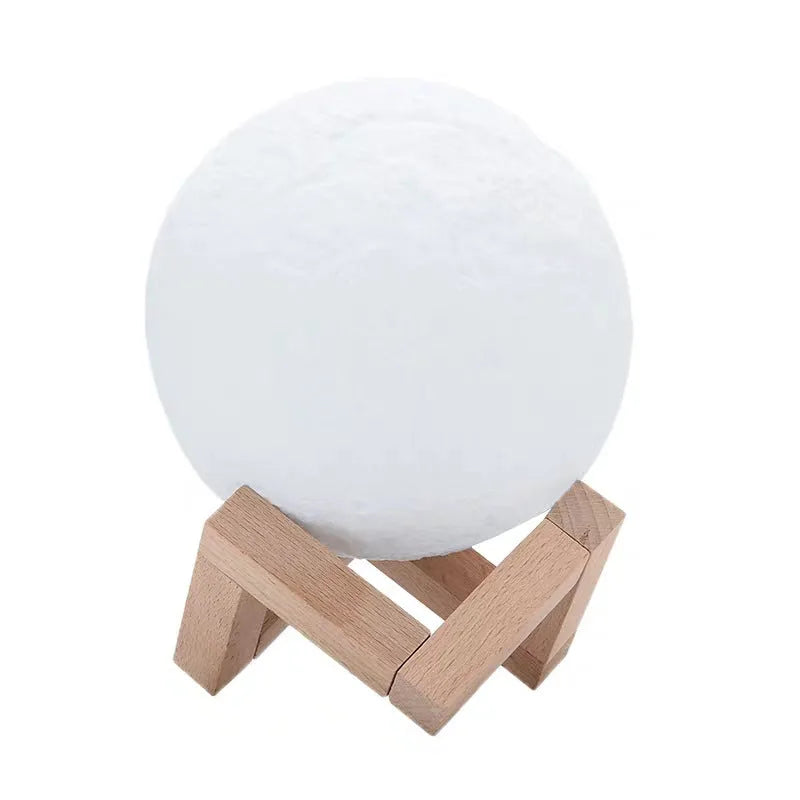 16-colour night light in 8 sizes from 8cm to 22cm on a bedside table