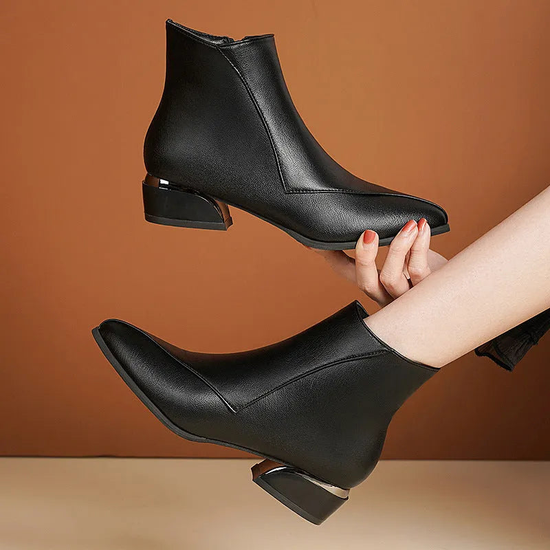 Women's chunky heel Martin boots in black with side zipper and leather stitch detail