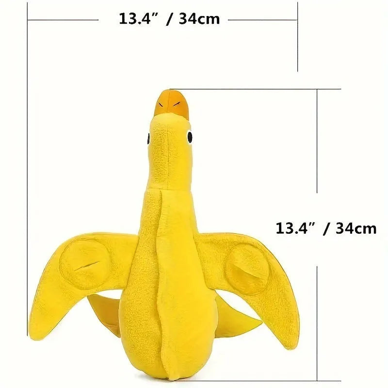 Yellow plush duck dog toy with squeaker and treat-dispensing feature for training and play.