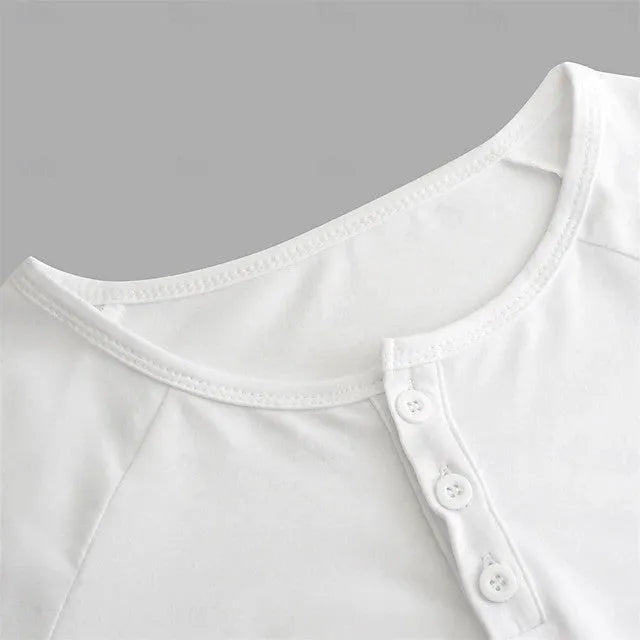 Men's white long-sleeved shirt with a Henry collar, showing collage stitching detail on the front.