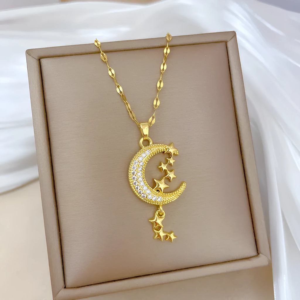 Moon pendant necklace with tassel details on stainless steel chain