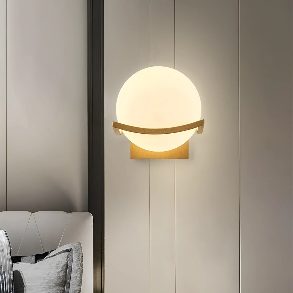 European wall lamp with black base and milky white cover, mounted on bedroom wall