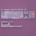 Wenshao Sleeping Lotus PBT keycap set with side-engraved translucent legends, showing 130 keys for mechanical keyboards.