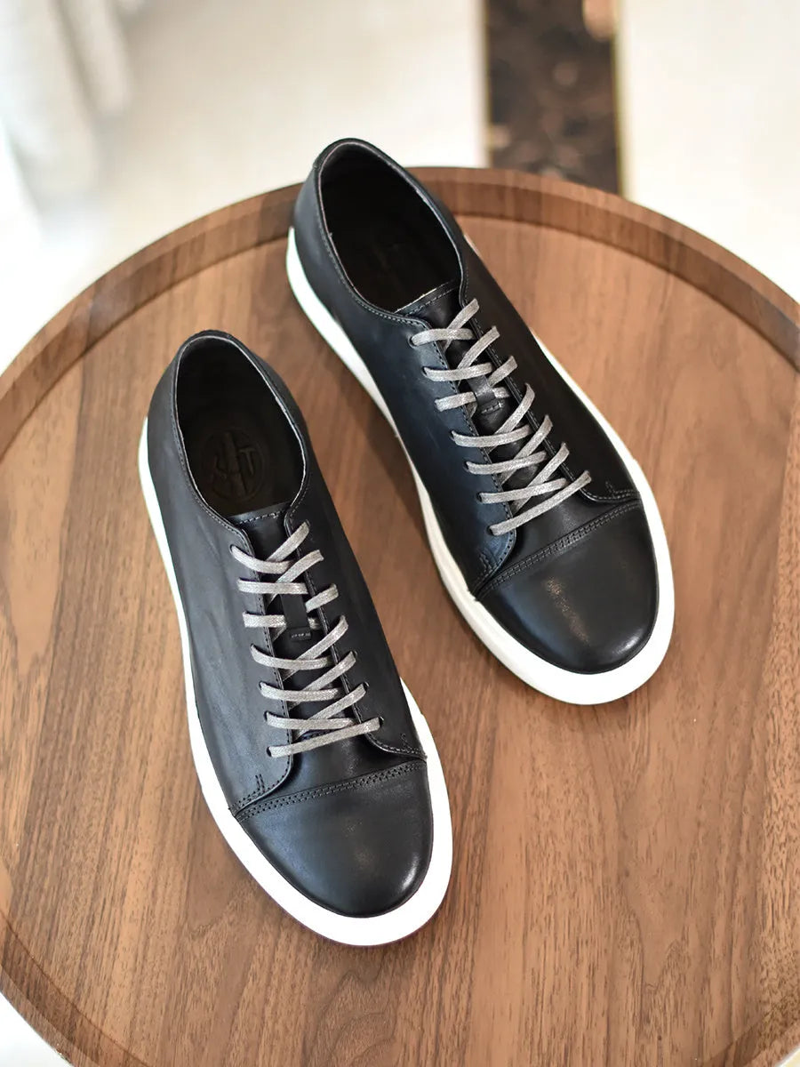 Men's handmade first-grain horse leather distressed casual shoes in dark brown with lace-up closure and stitching