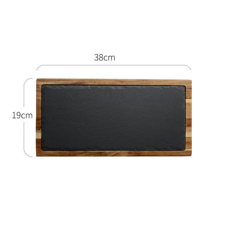 Black wooden pizza dish made from acacia wood and stone, multi-colour sets, on a table
