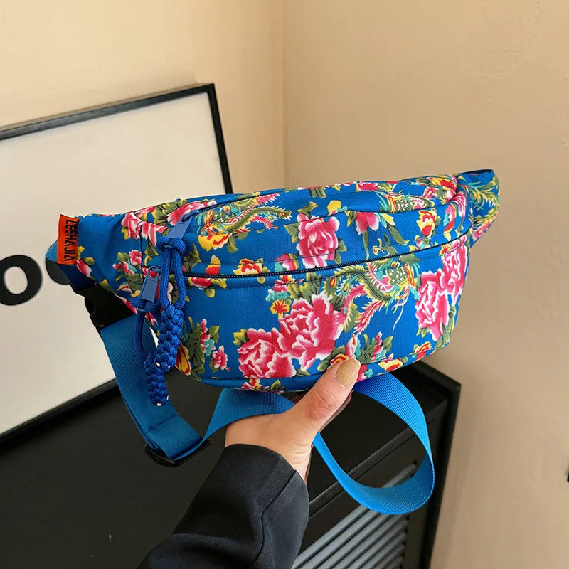 Women's floral Western style waist bag with three-dimensional pocket in black, red, green or blue colour options