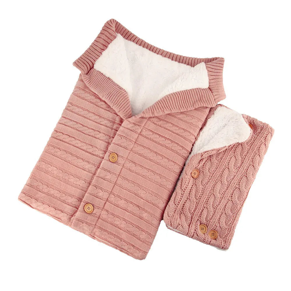 Baby sleeping bag in beige with button opening and matching pram handrail set