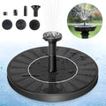 Solar floating fountain with round black panel and four spray nozzles on water surface